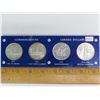 Set of 4 Canadian Commemorative Silver Dollars. Includes 1935 25th Anniversary of George V, 1939 Roy