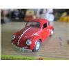 Image 2 : Volkwagen Beetle model car and VW badge