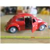Image 3 : Volkwagen Beetle model car and VW badge