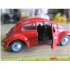 Image 4 : Volkwagen Beetle model car and VW badge
