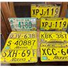 Image 1 : 11 License plates - 10 Alberta - 3 are pairs and 1 - 1968 Idaho