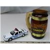 Image 1 : RCMP mug & NYC police car