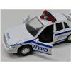 Image 6 : RCMP mug & NYC police car