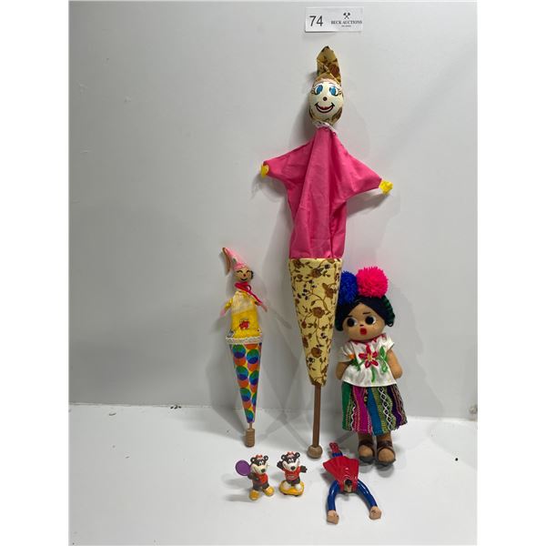 Pop-Up Clown Dolls and Assorted Small Dolls