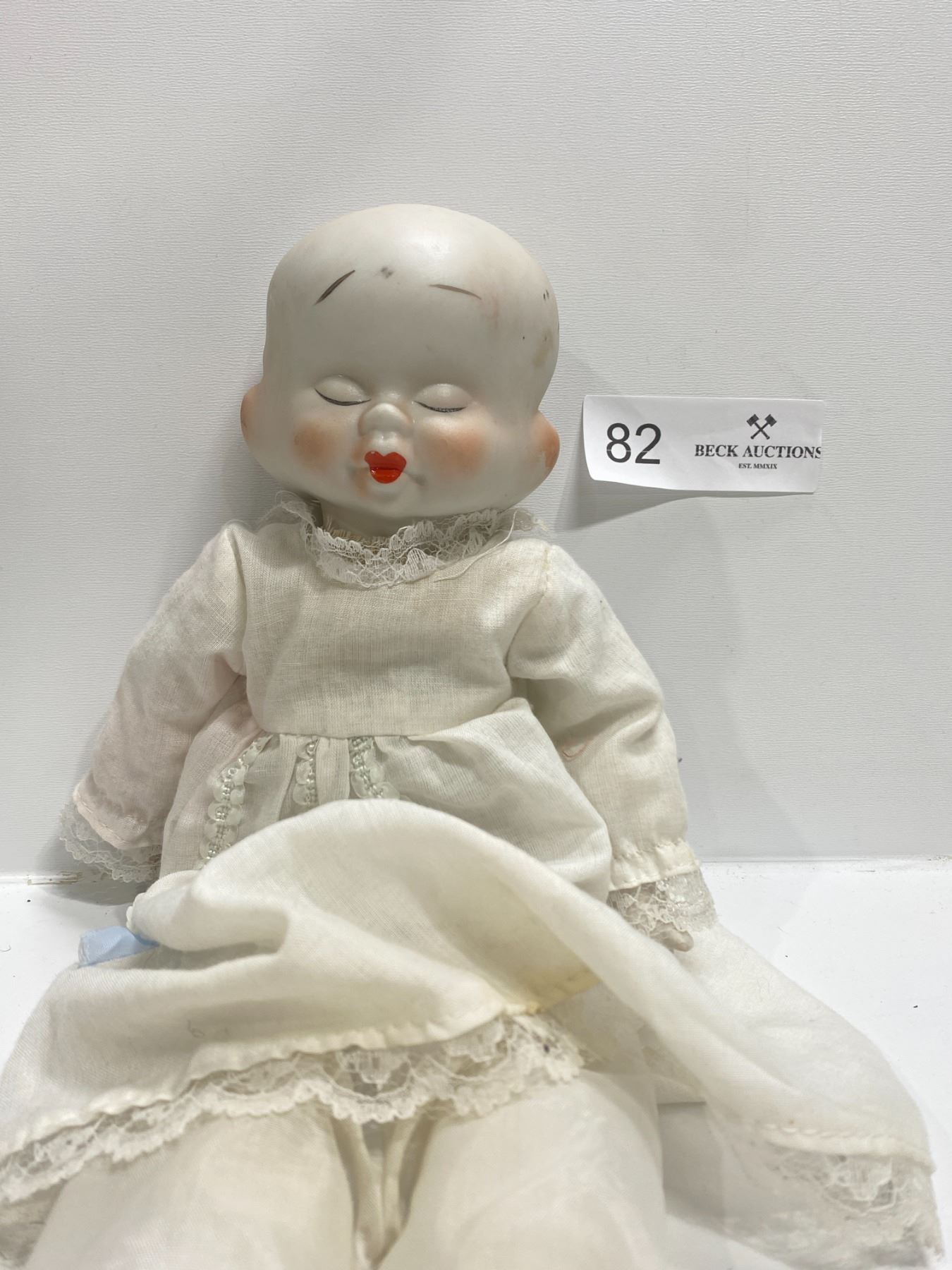 Three Faced Porcelain Doll Beck Auctions Inc.