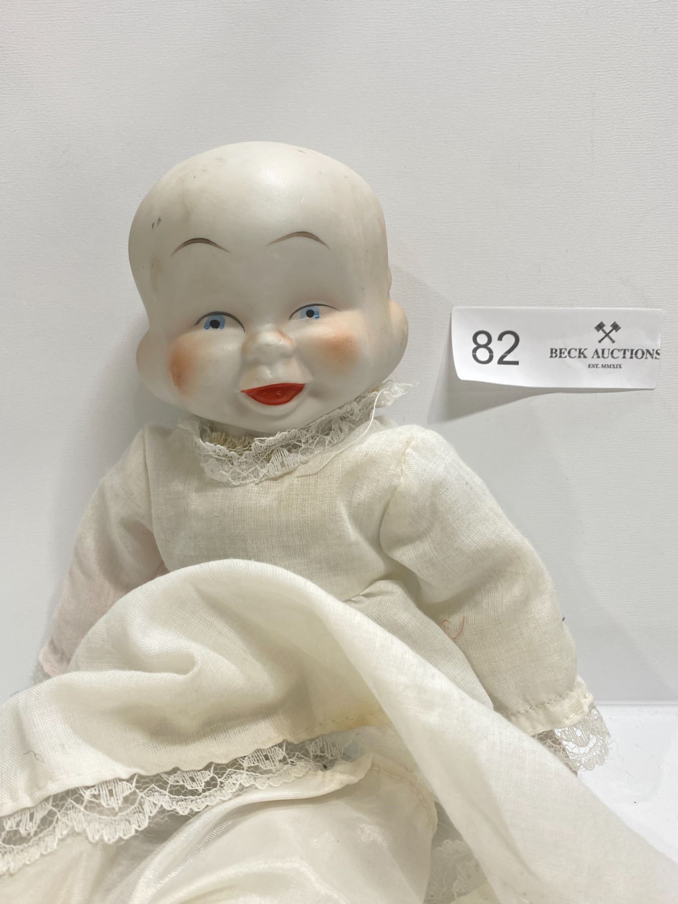 Three Faced Porcelain Doll Beck Auctions Inc.