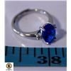 Image 1 : 7 X 10 OVAL BLUE CZ WITH A CLEAR CZ ON