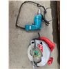 Image 1 : Makita 10mm Drill (Model 6511LVR) and Skilsaw 5400 Circular Saw (7-1/4" 184mm)