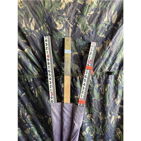 Assortments Of Measuring Sticks And Tools