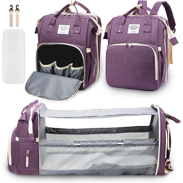 NEW PURPLE BACKPACK WITH CHANGING STATION IN IT