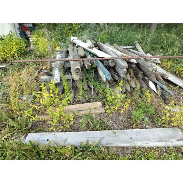 Large Assortment of Wooden Fenceposts