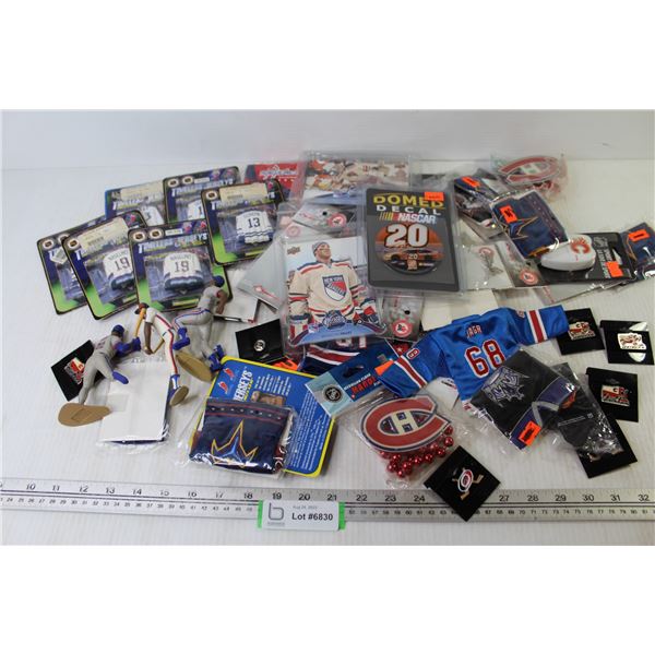 Large Assortment of Sports Team Memorabilia