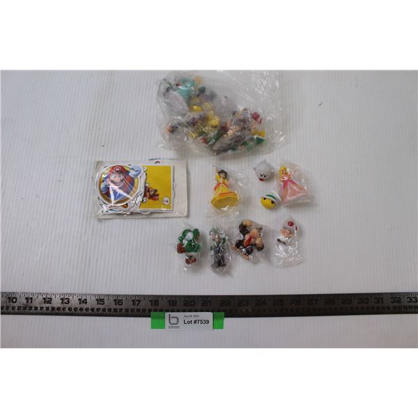 Assorted Mario Figurines and Stickers