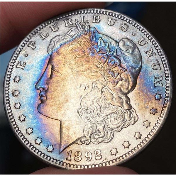 Toned 1892-O Morgan Silver Dollar MS64