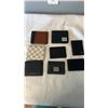 Image 1 : 8 UNAUTHENTICATED DESIGNER MENS WALLETS  - LOUIS VUITTON, MICHAEL KORS, HERSCHEL, FOSSIL, ETC