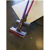 Image 2 : 2 DYSON STICK VACUUMS V10 ANIMAL AND V6 ANIMAL FOR PARTS OR REPAIR