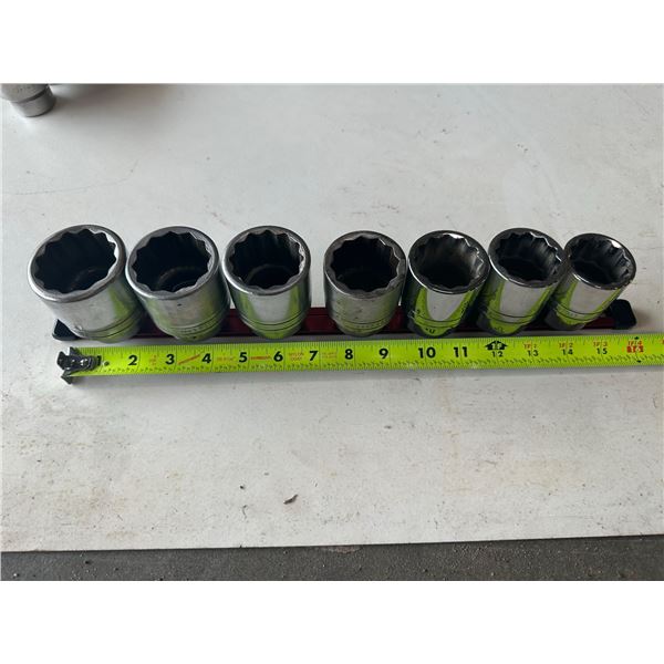SET OF SNAP-ON THREE-QUARTER INCH LARGE SOCKETS. COME ON SLIDE OF ...