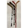 Image 1 : FOUR HOCKEY STICKS