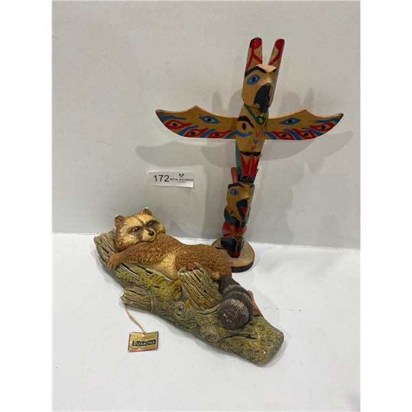 Hand-painted Statue And Indigenous Totem