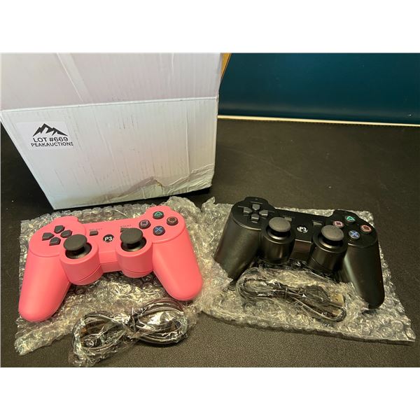 Lot of 3 PS3 Controllers - Black & Pink