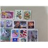 Image 4 : Qty 90+ USA Stamps: Audrey Hepburn, Christmas, Olympics, Canoes, Airplanes, etc