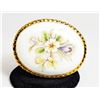 Image 1 : OVAL VINTAGE PORCELAIN BROOCH WITH FLORAL