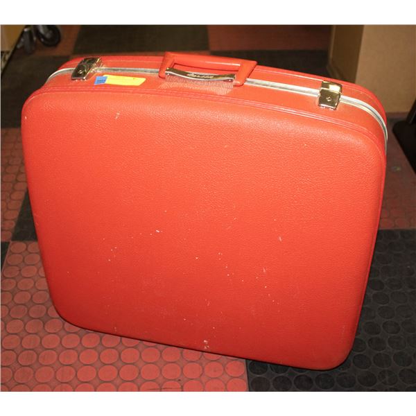RED MEDIUM SIZED SUITCASE.