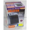 Image 1 : CERAMIC POWER HEATER- HOLMES BRAND IN BOX