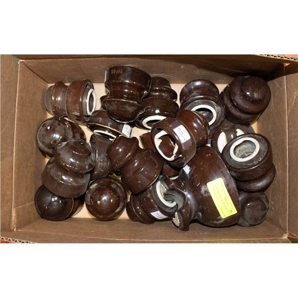 BOX OF VINTAGE CERAMIC INSULATORS.