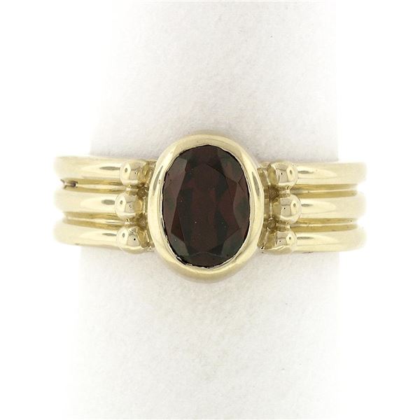 14K Yellow Gold 1.30 ctw Bezel Set Oval Garnet Solitaire Grooved Wide Band Ring