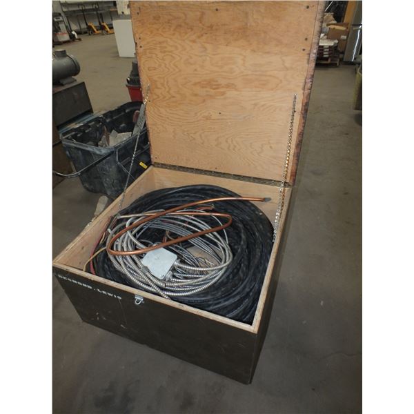 Wooden Box On Wheels Of Electrical Wire