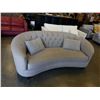 Image 1 : GREY TUFTED SEMI CURVED SOFA WITH TWO THROW CUSHIONS