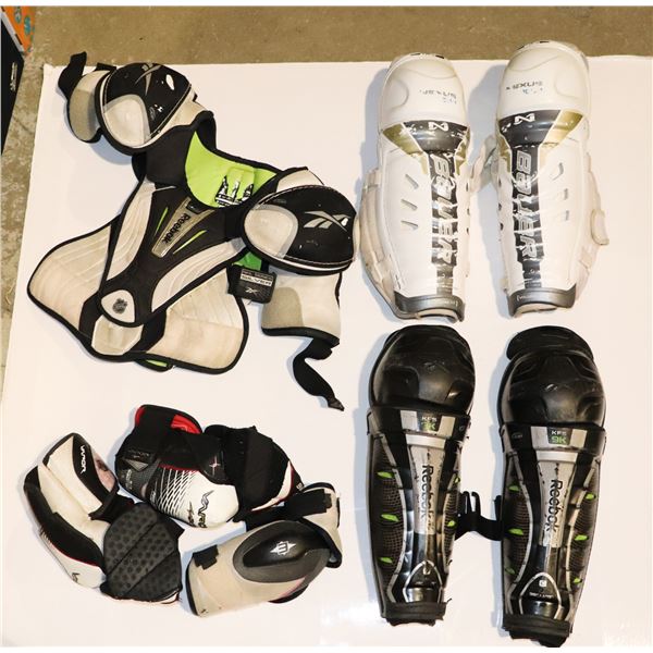 LARGE BOX OF HOCKEY EQUIPMENT