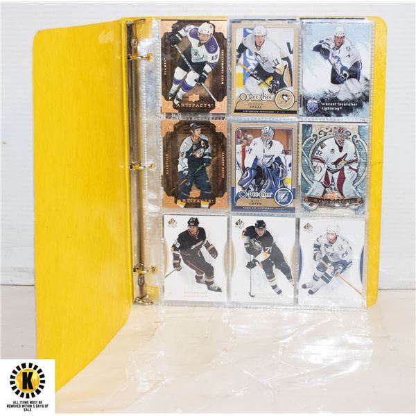 7 PAGE BINDER OF ASSORTED HOCKEY CARDS