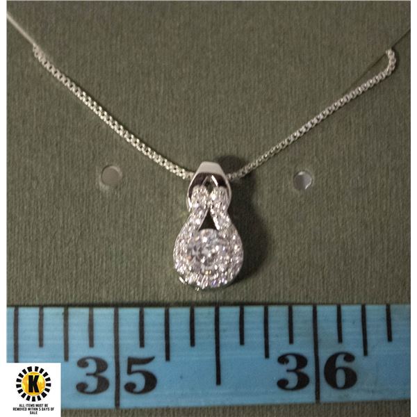 #119 0.80 CT ROUND CUBIC ZIRCONIA IN CENTER OF TEA