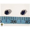 Image 1 : #106 6 X 8 MM BLUE OVAL STONE WIT A HALO