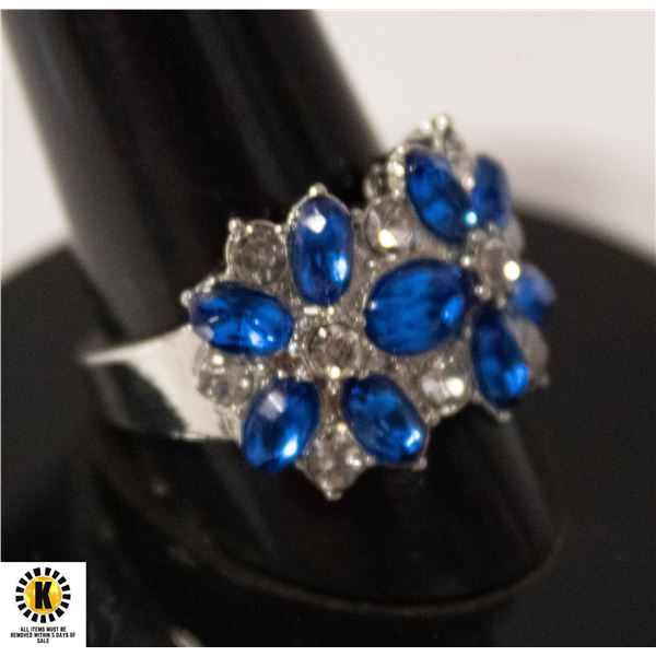 #101 OVAL BLUE STONES IN SHAPE OF FLOWER WITH