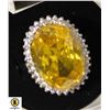Image 1 : #112 13 X 18 MM OVAL YELLOW STONE SURROUNDED