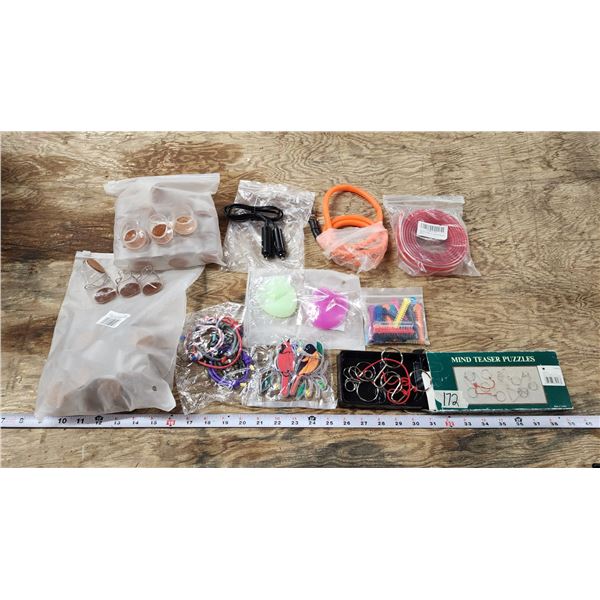 Collection of Misc. Items - Mind teaser puzzles, silicone body scruber, bracelets, etc..