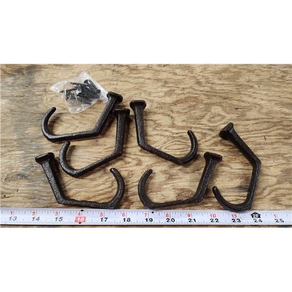 Cast iron coat hooks - looks like a rail spike head