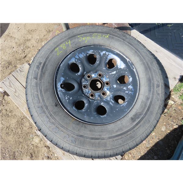 Goodyear Wrangler P265/70R17 Tire with rim