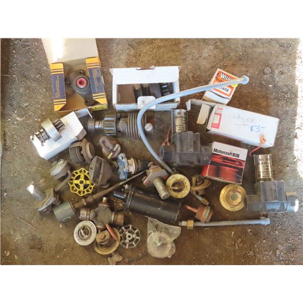 Box of assorted automobile parts