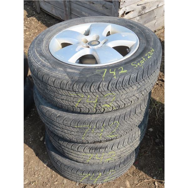 Set of 4 Dunlop tires with rims: 195/65R15 91H