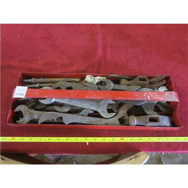 tool tray of vintage wrenches, hammer heads, chisels, etc.