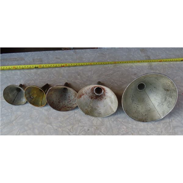 Set of 5 antique tin funnels