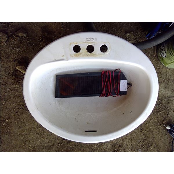 Solar charger and sink