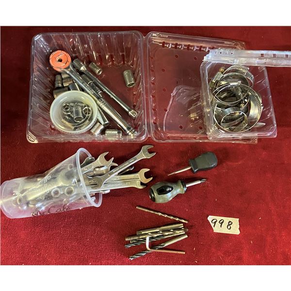 Lot of assorted items including wrenches, hose clamps, drill bits etc..
