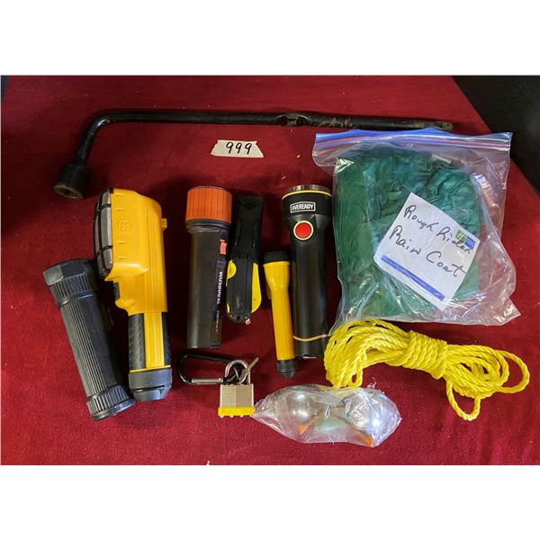 Lot of assorted items including wrench, flashlights, rope, safety glasses, etc..