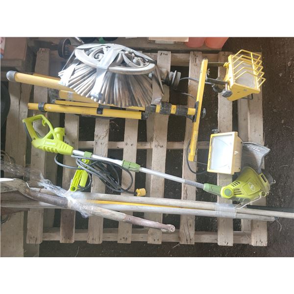 pallet of unclaimed merchandise (must take all) rakes, shovels, work light, bird bath, whipper snipp