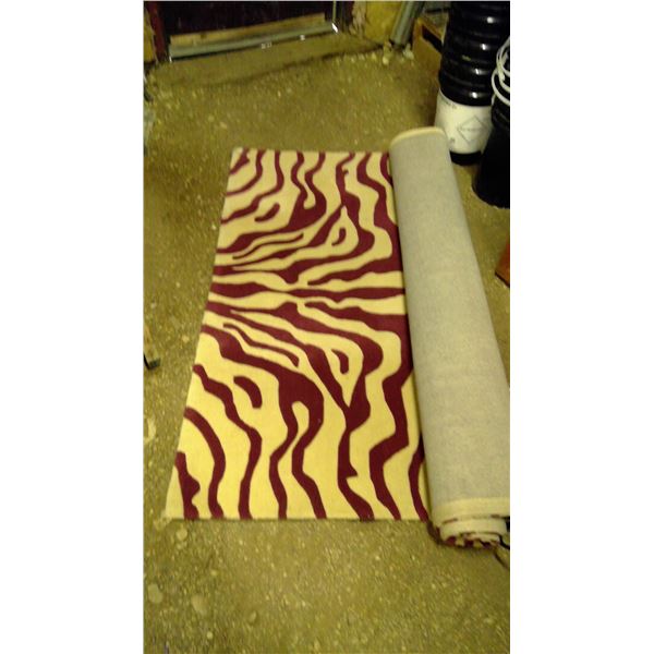 Large purple and cream carpet